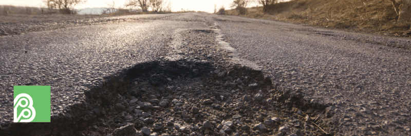 Why Was I Penalized For Hitting a Pothole? The Truth About Potholes and Insurance Surcharges